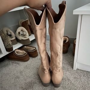 Nude/taupe western inspired knee boots.
